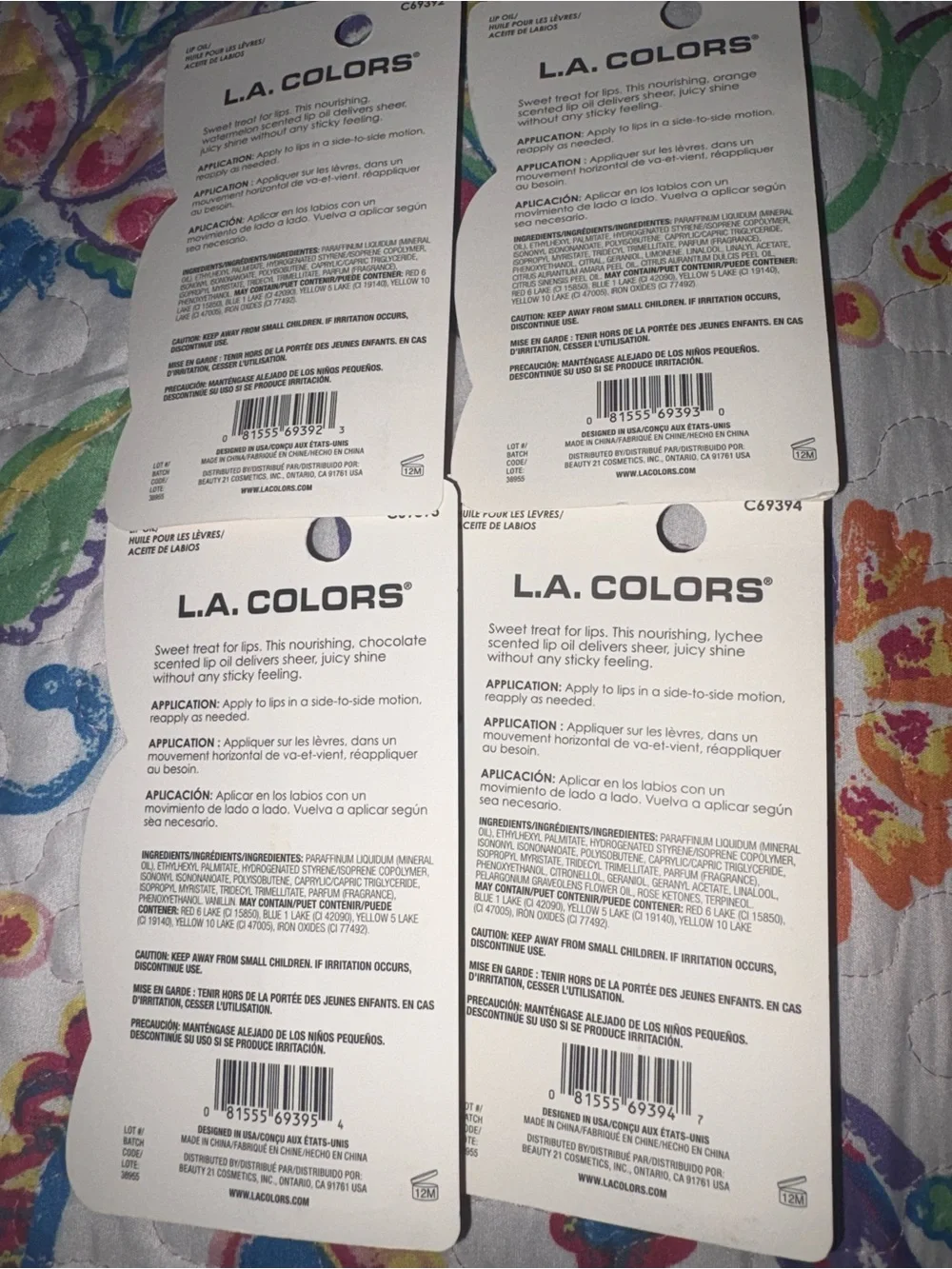 L.A. Colors Lip Oil Set - Pink, Yellow, Green & Coral Glosses